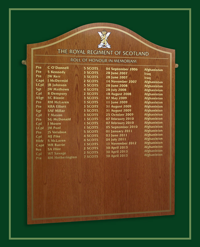 Large memoriam roll of honour plaque in golden oak made for the Royal Regiment of Scortland.