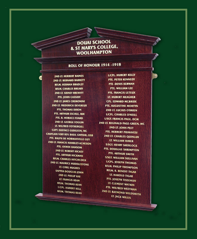 Douai School World War One Roll of honour board with gold lettering on deep red oak.