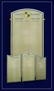 An unusual set of three boards made from Beech with blue lettering and school badge.